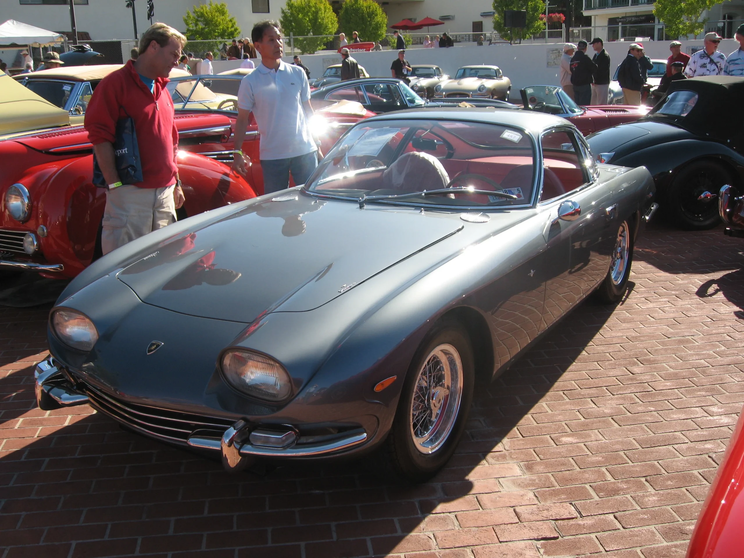The Lamborghini 350 GT, the first road car built by Ferruccio Lamborghini, debuted in 1963 as a direct response to Enzo Ferrari