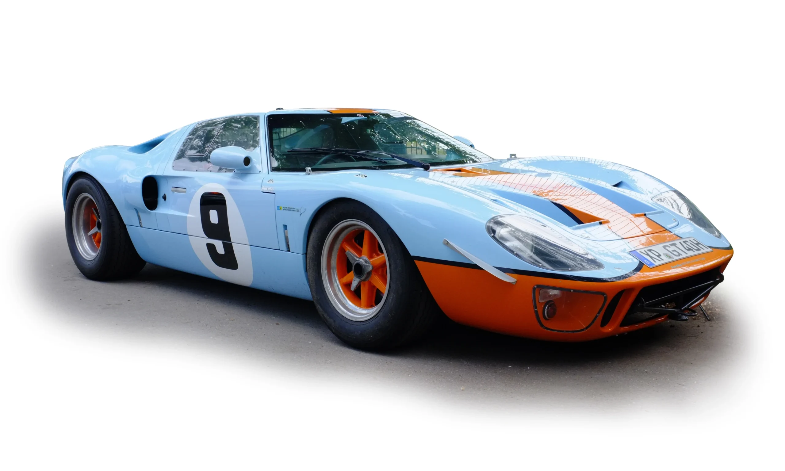 A Ford GT40 racing at Le Mans in 1966, the year Ford finished 1st, 2nd, and 3rd to defeat Ferrari