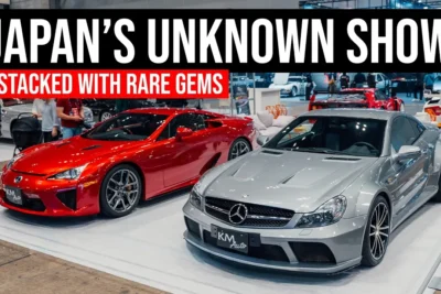 A row of rare and valuable classic cars including a Lexus LFA and an AMG Mercedes Black Series on display at the Automotive Council 2026 at the Makuhari Messe in Japan.