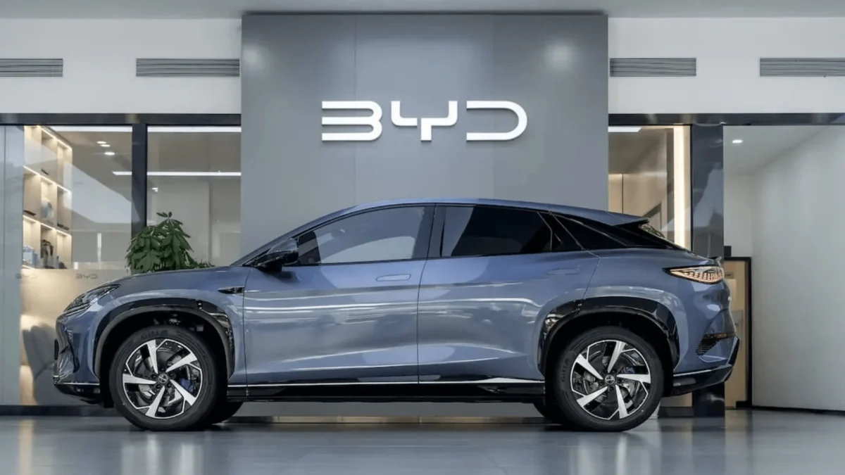 A BYD electric vehicle showroom in a Canadian urban setting, representing the Chinese automaker's entry into the Canadian market following the Carney-Xi tariff deal.