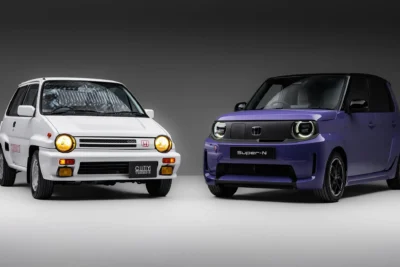 The 2026 Honda Super-N electric city car in purple two-tone paint showing its boxy kei-car-inspired arches and compact proportions ahead of its UK summer launch.