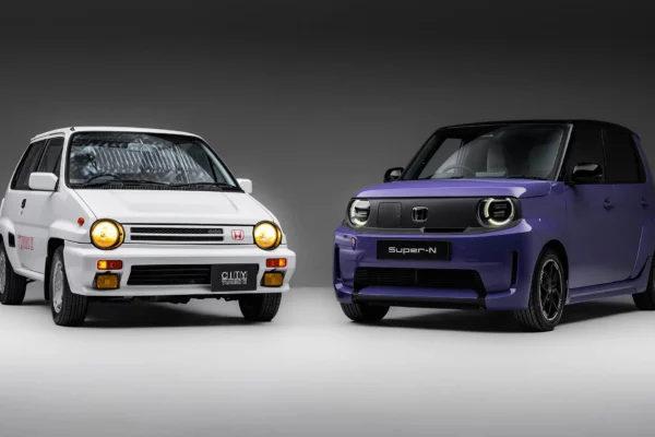 The 2026 Honda Super-N electric city car in purple two-tone paint showing its boxy kei-car-inspired arches and compact proportions ahead of its UK summer launch.