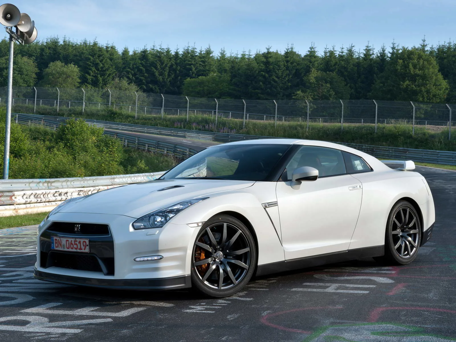 A Nissan GT-R R35 at speed on the Nürburgring Nordschleife