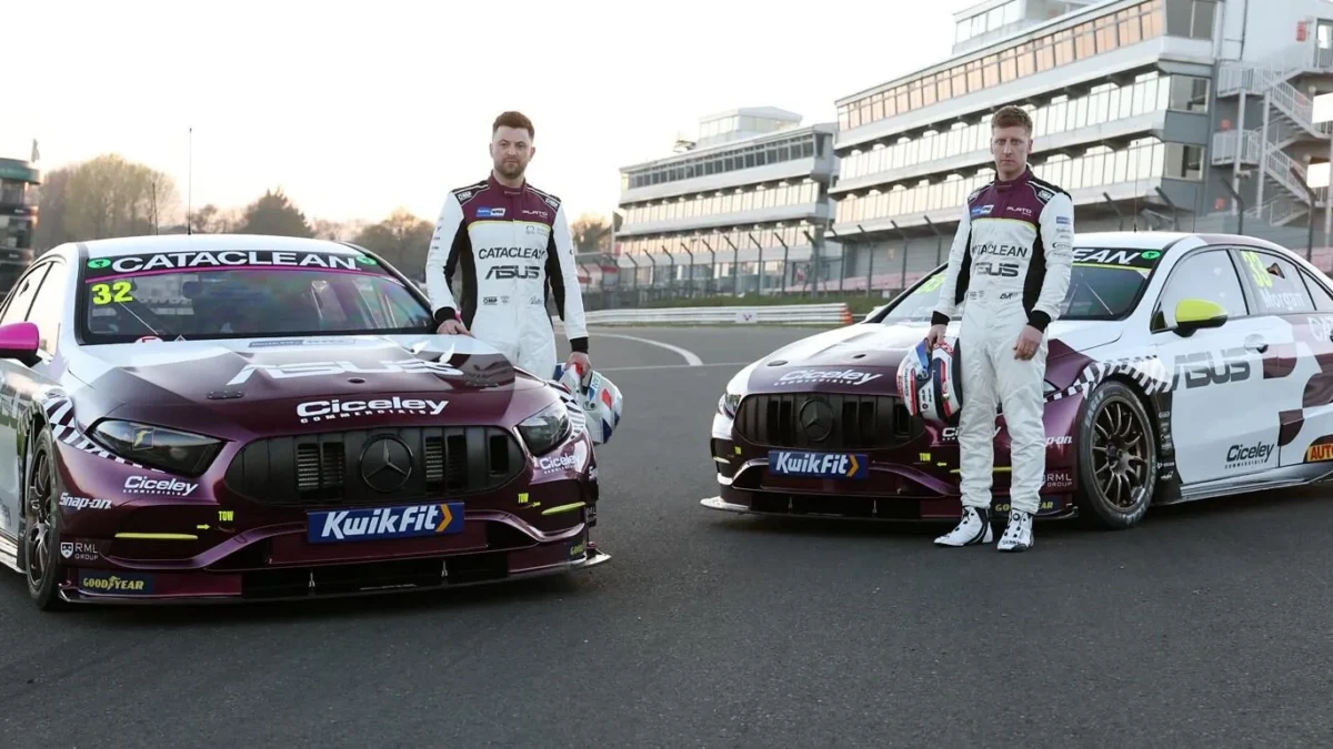 Jason Plato's purple and white Mercedes-AMG A35 BTCC race cars for Plato Racing's debut 2026 season, photographed in the team's Wellingborough workshop next to RML's facility.