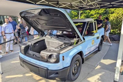 The Slate Auto electric pickup truck in its bare-bones base configuration at the company's Warsaw, Indiana factory, representing the Bezos-backed startup's bid to bring affordable EVs to America.