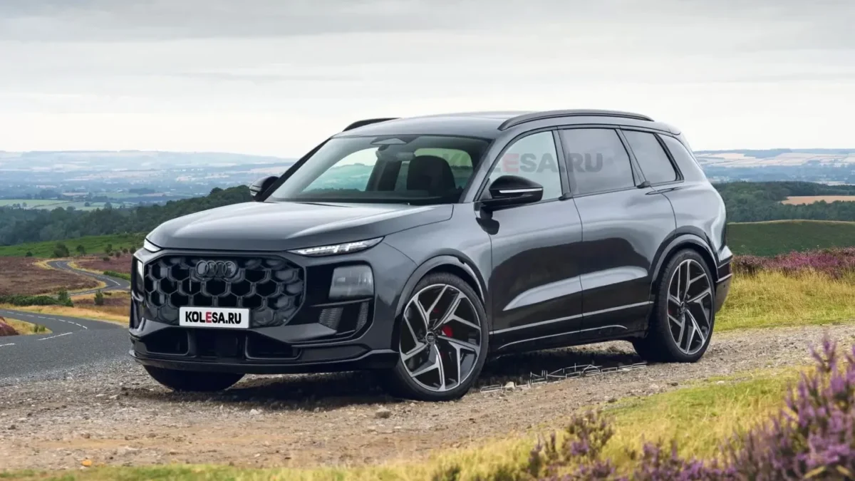 A 2027 Audi Q9 full-size luxury SUV photographed with its Digital Matrix LED headlights illuminated.