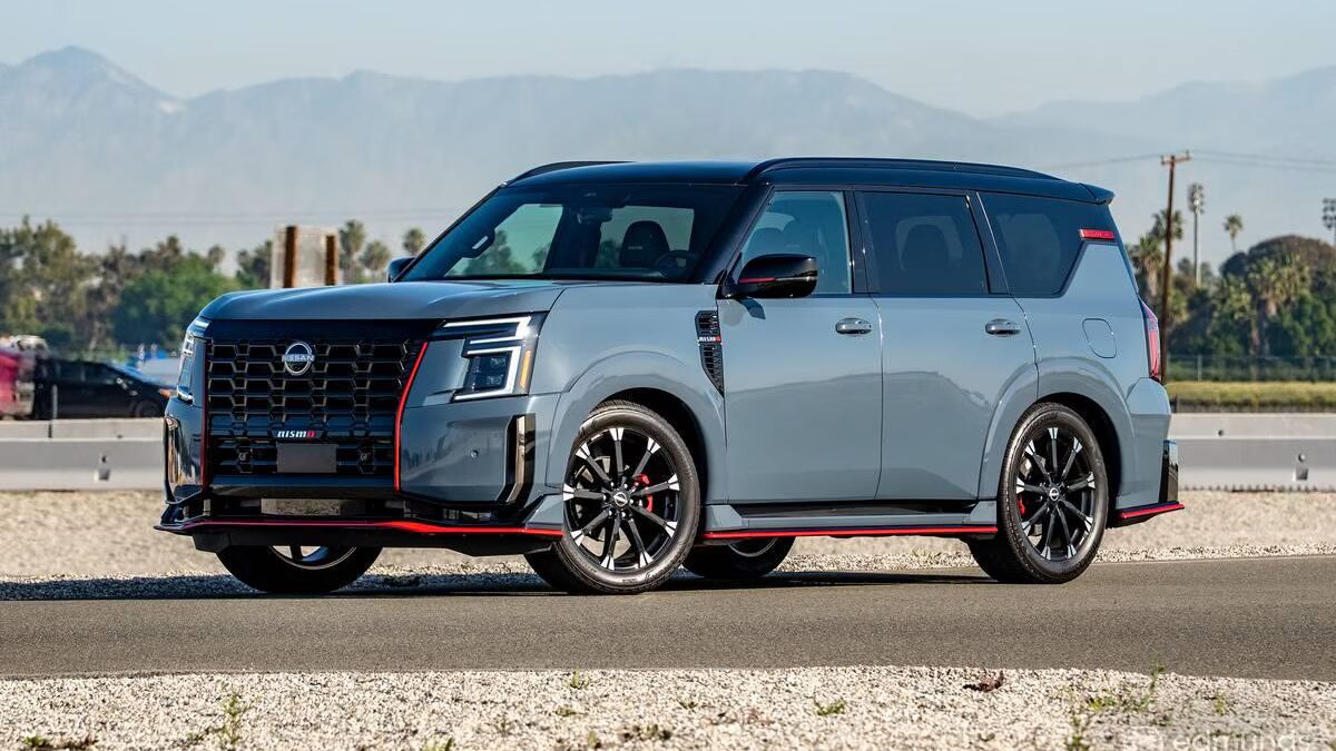 The 2026 Nissan Armada Nismo in Stealth Gray with Nismo-exclusive front fascia, 22-inch forged wheels, and roofline spoiler, representing Nissan's first performance-branded full-size SUV.
