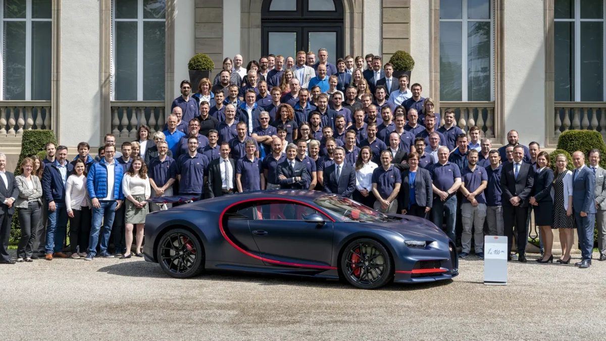 A Bugatti Chiron parked outside the brand's Molsheim factory in France, representing Porsche's divestment of its Bugatti Rimac stake to a private equity consortium.