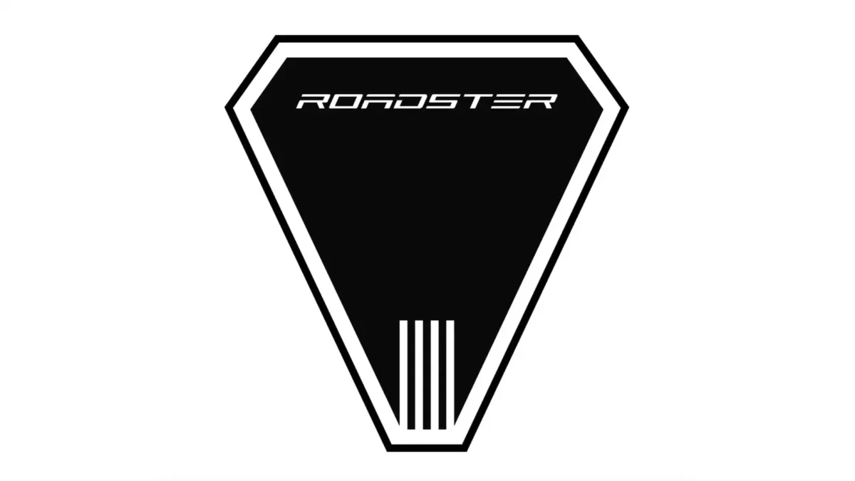 Tesla’s new triangular Roadster badge trademark filing, featuring stylised lines representing speed and propulsion, submitted to the USPTO ahead of a planned late May 2026 reveal.