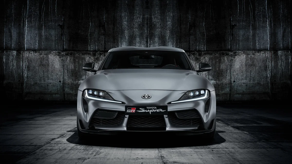 The 2019 Toyota GR Supra A90 in red, co-developed with BMW on the same platform as the Z4, marking the Supra's return after a 17-year absence